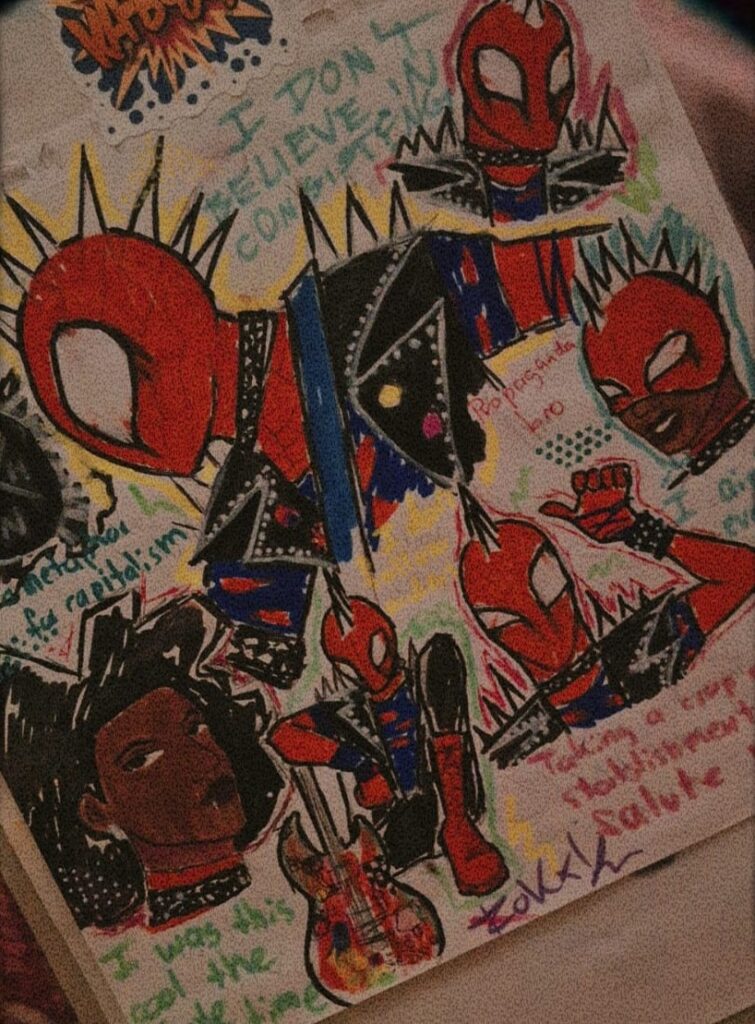 Photograph of a sketchbook page that contains illustrations of the author